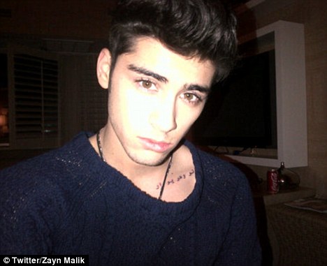 One Direction's Zayn Malik new tattoo 2012 Zayn Malik Shows new tatto over